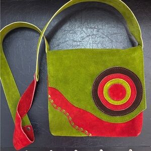 Red/green handmade suede bag from Peru.​